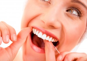 flossing 300x211 - 4 Steps to Better Health Through Great Dental Habits