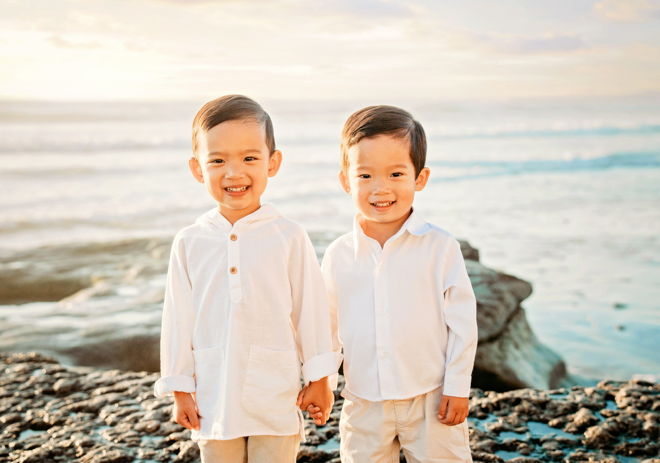 Two cute little boy near the beach